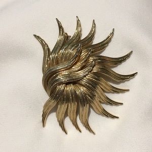 Vintage gold tone sun brooch